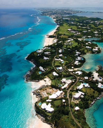 An aerial view of Bermuda with white sand beaches and blue waters.